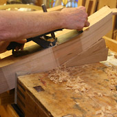 Hand shaping of St. Joseph Presider Chair Arm