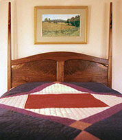 Howard  Pencil Post Bed with Curly Black Walnut Headboard and Drawers - Headboard