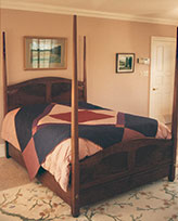Howard  Pencil Post Bed with Curly Black Walnut Headboard and Drawers - Overview